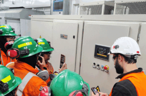 On-site practical training session conducted at a mining environment around an installed SER Drive, focused on operation and monitoring of a high power Slip Ring Motor with LRS technology, covering system behavior, rotor current control, and operational protection supported by Electrodrives